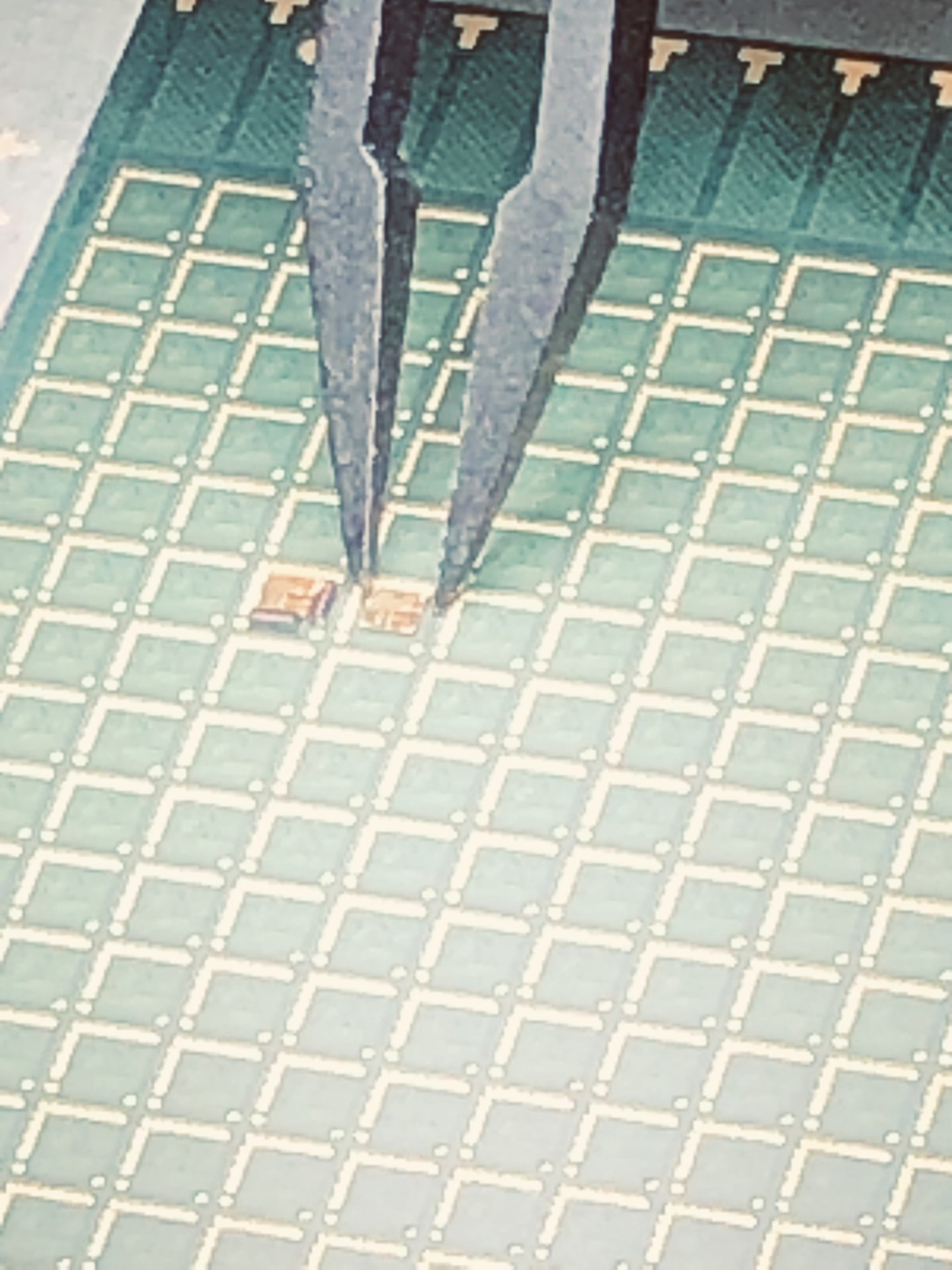 Tweezers on wafer